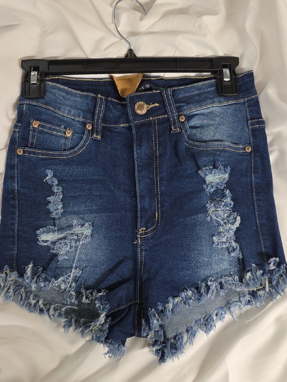 High-Rise Distressed Denim Shorts in Dark Blue